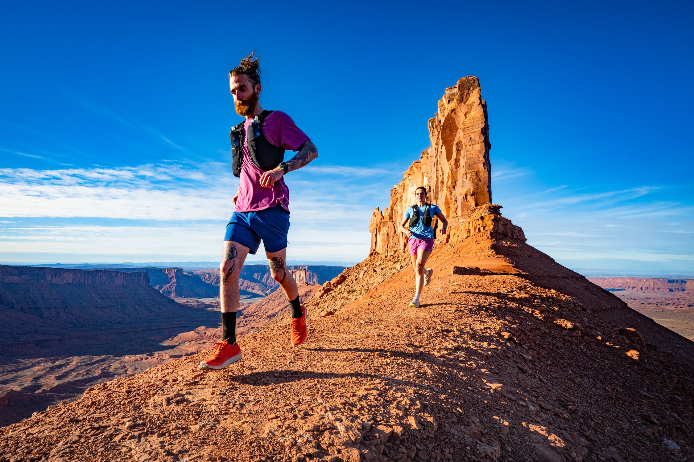 Two runners heading up toward The Rectory, Castle Valley